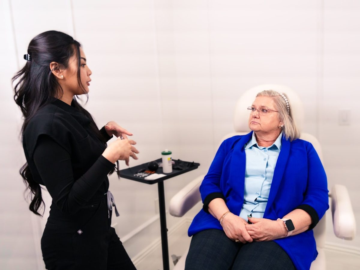 Provider consulting with a patient about their treatment plan